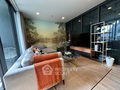 Stylish modern living room with large windows and scenic wall mural