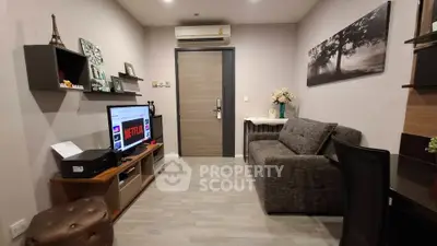 Cozy living room with modern decor and entertainment setup