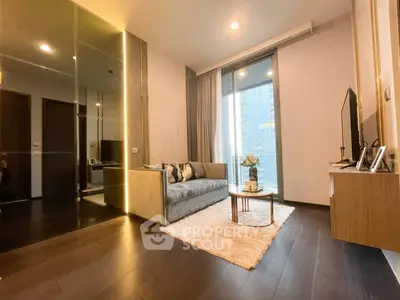 Modern living room with sleek design and floor-to-ceiling windows offering city views.