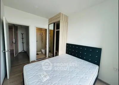 Modern bedroom with ensuite bathroom and stylish decor