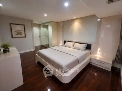 Luxurious modern bedroom with elegant decor and polished wooden floors