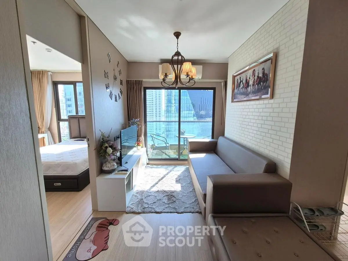 Modern living room with balcony view in stylish apartment