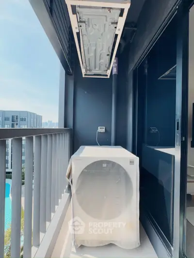 Modern balcony with pool view and covered air conditioning unit