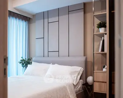 Modern bedroom with stylish decor and natural light