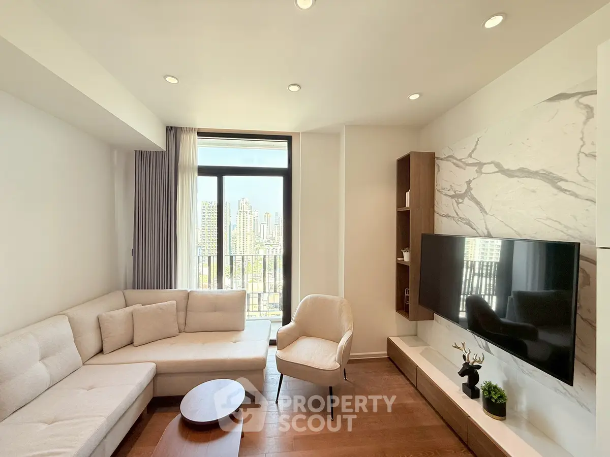 Modern living room with city view, featuring elegant furniture and large TV, perfect for urban living.