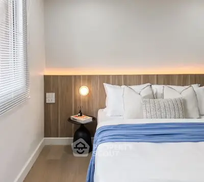 Modern bedroom with stylish decor and cozy ambiance