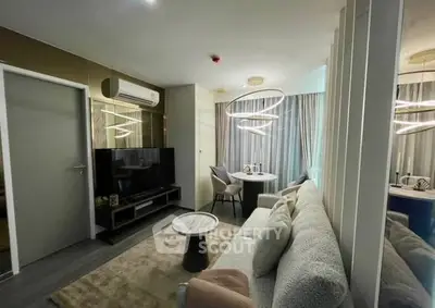 Modern living room with stylish lighting and cozy seating area