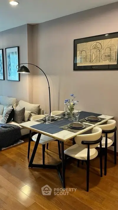 Stylish dining area with modern decor and elegant table setting in a cozy living space.