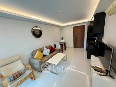 Modern living room with sleek furniture and ambient lighting