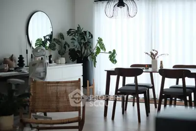 Stylish modern dining area with elegant furniture and natural light