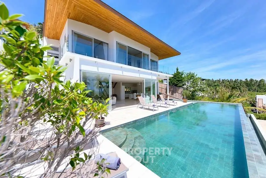 Luxurious modern villa with infinity pool and stunning tropical views