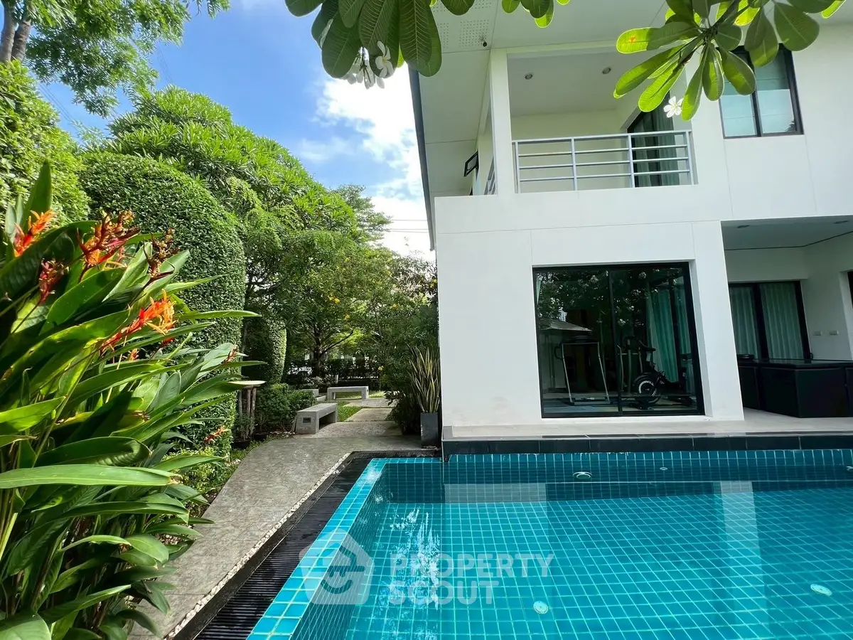 Luxurious modern home with private pool and lush garden