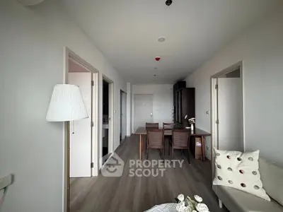 Spacious modern living room with elegant dining area and stylish decor