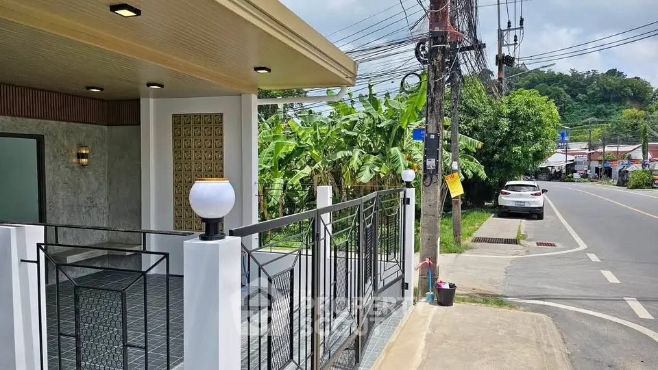 Charming modern home with stylish exterior and lush greenery, perfect for serene living near urban amenities.