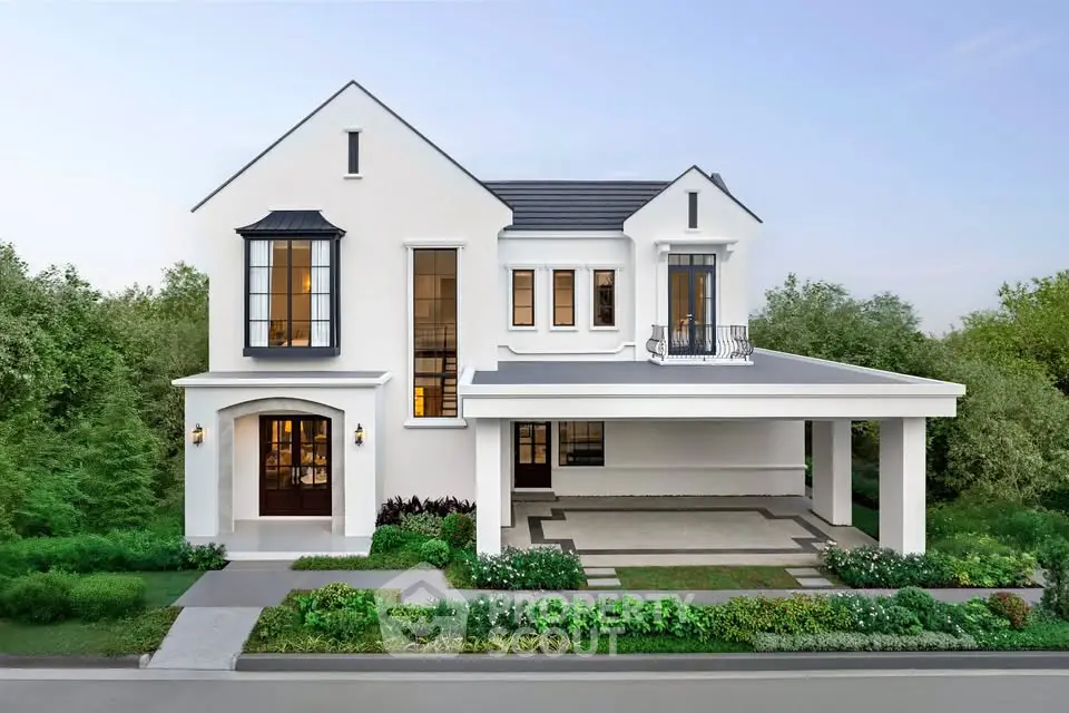 Stunning modern two-story house with elegant facade and lush greenery, perfect for luxurious living.