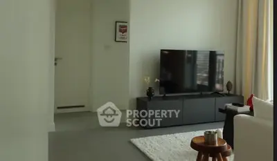 Modern living room with sleek TV setup and stylish decor