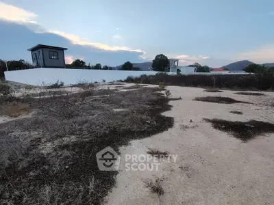Expansive plot of land with scenic views, ideal for development opportunities in a serene location.
