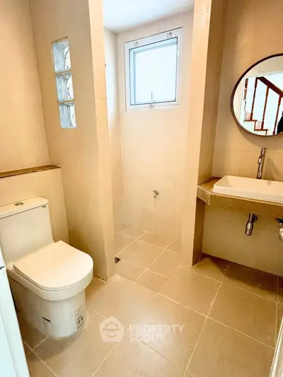 Modern bathroom with sleek fixtures and natural light