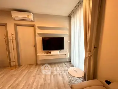 Modern living room with wall-mounted TV and air conditioning