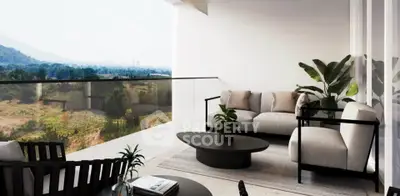 Luxurious balcony with modern furniture and stunning mountain view, perfect for relaxation.