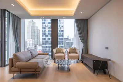 Luxurious modern living room with stunning city view and elegant furnishings.