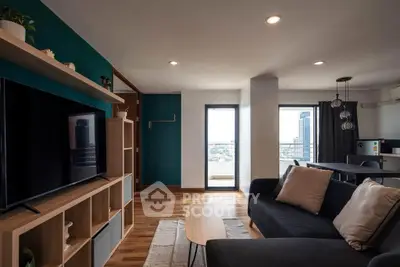 Modern living room with stylish decor and city view balcony
