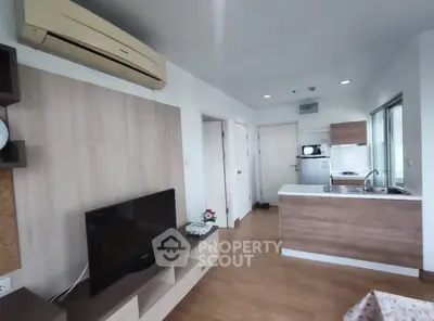 Modern living room with open kitchen and stylish decor