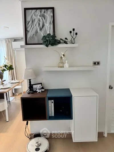 Modern interior with stylish shelving and decor in a cozy living space