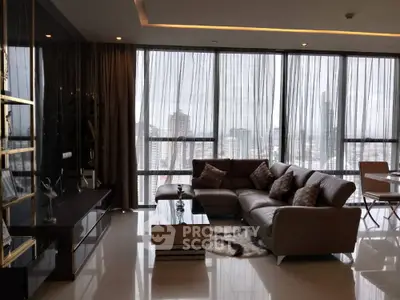 Luxurious living room with panoramic city view and modern furnishings