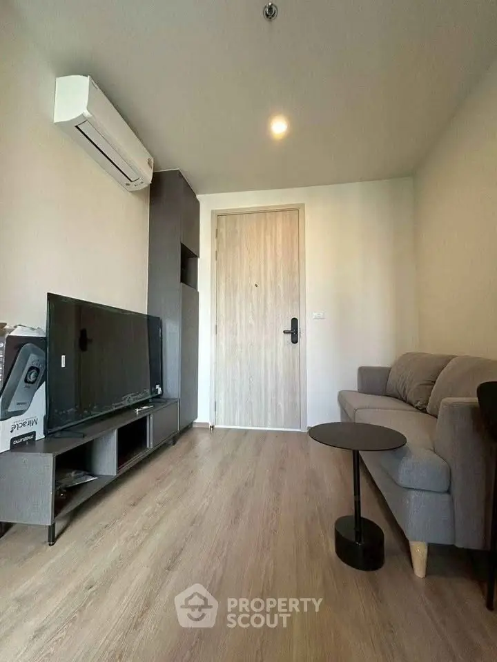 Cozy living room with modern decor and wooden flooring