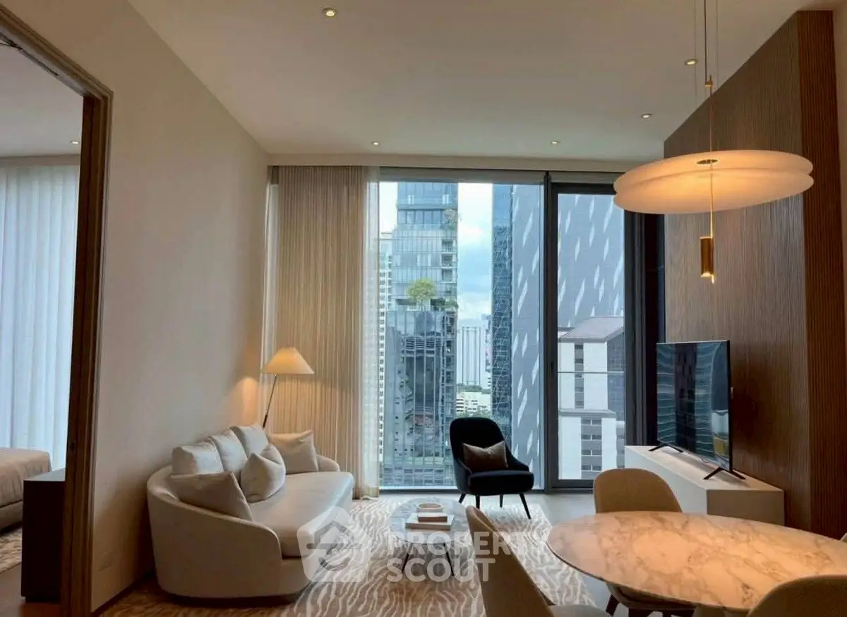 Modern living room with city view, elegant furniture, and stylish lighting.