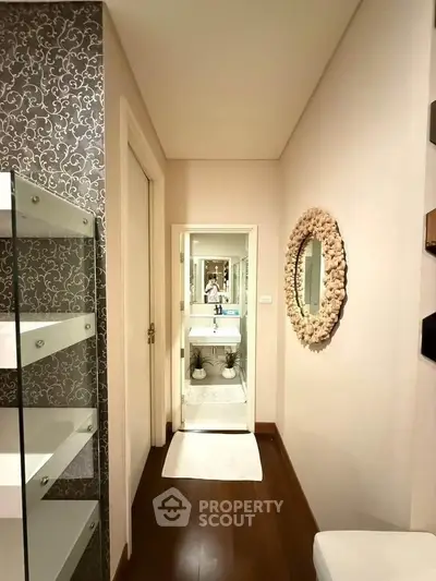 Stylish bathroom with elegant decor and modern fixtures in a luxurious home.