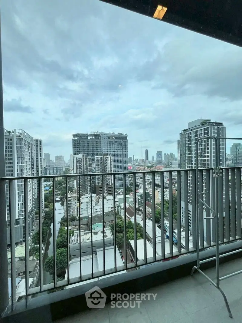 Stunning cityscape view from modern balcony in high-rise apartment
