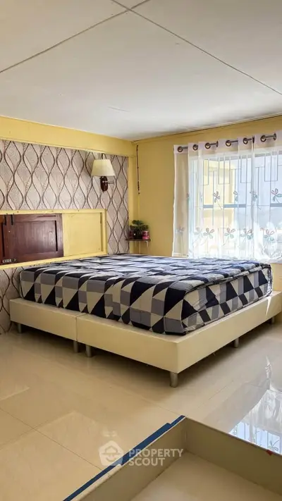 Cozy bedroom with modern decor and natural light