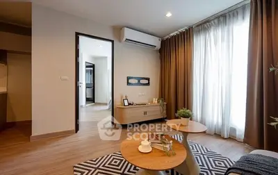 Modern living room with stylish furniture and natural light