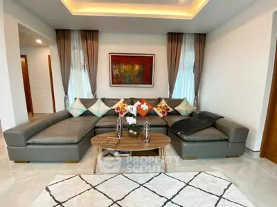 Luxurious modern living room with stylish sectional sofa and elegant decor