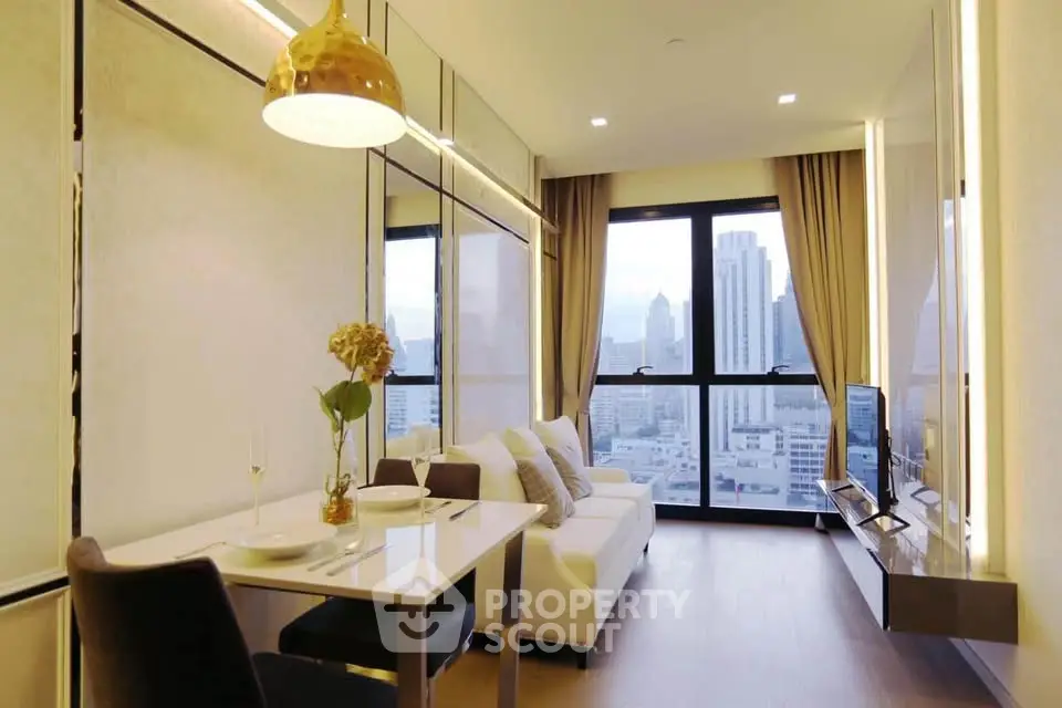Luxurious modern living room with city view, elegant decor, and ample natural light.