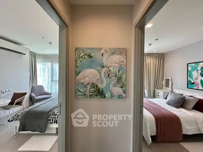 Modern apartment interior with stylish decor and natural light in living and bedroom areas.