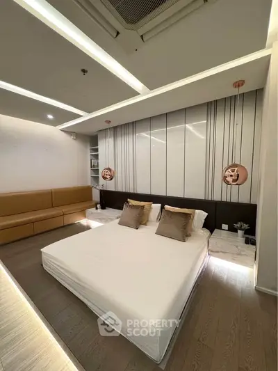 Luxurious modern bedroom with elegant lighting and stylish decor
