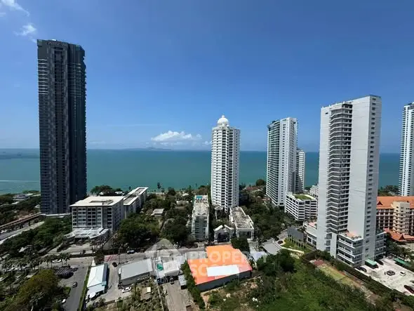 Stunning ocean view from high-rise condos in a vibrant coastal cityscape.