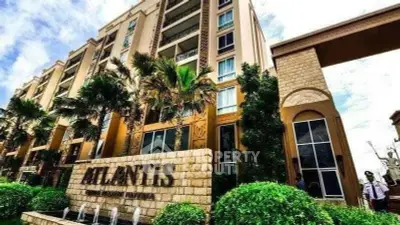 Luxurious Atlantis condominium exterior with lush landscaping and elegant architecture.