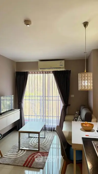 Modern living room with balcony access and stylish decor