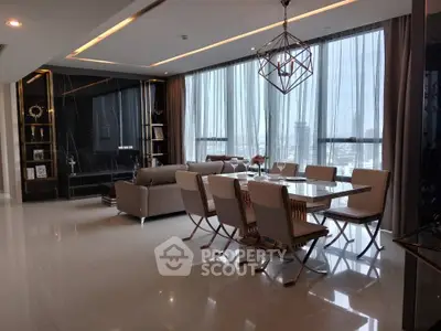 Luxurious modern living room with elegant dining area and panoramic city view.