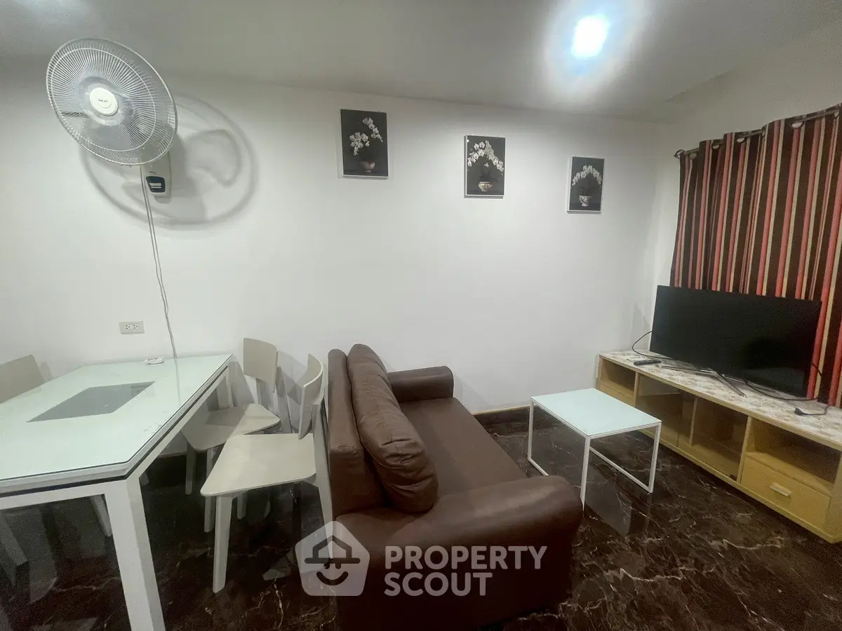 Cozy living room with modern decor and comfortable seating