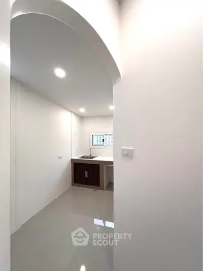 Minimalist kitchen with sleek design and modern fixtures