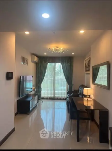 Elegant living room with modern furniture and large window view