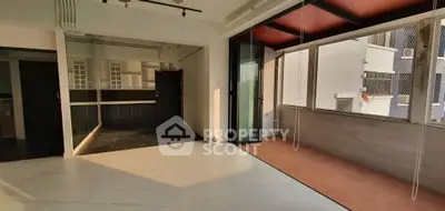 Spacious modern apartment with open layout and large balcony, perfect for urban living.