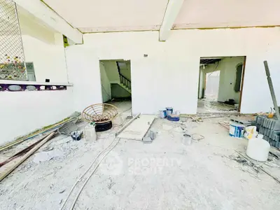 Spacious under-construction interior with potential for customization and modern design.
