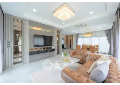 Luxurious living room with elegant decor and spacious dining area