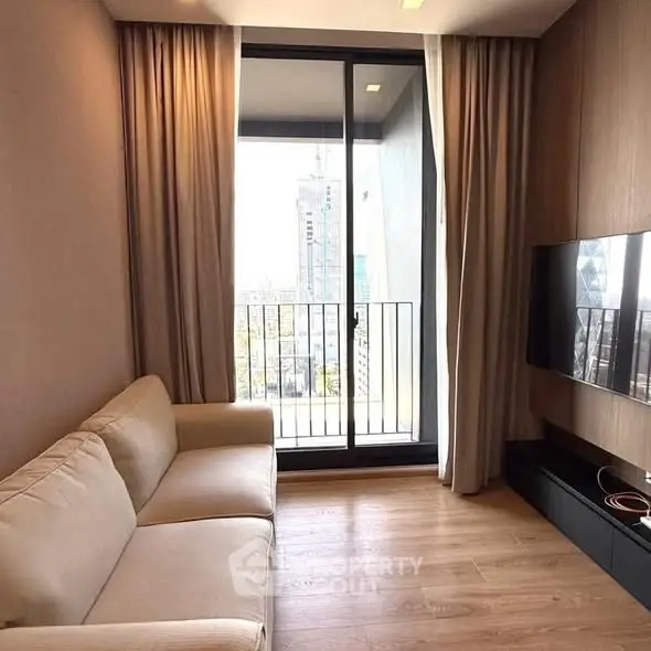 Modern living room with cozy sofa and city view balcony